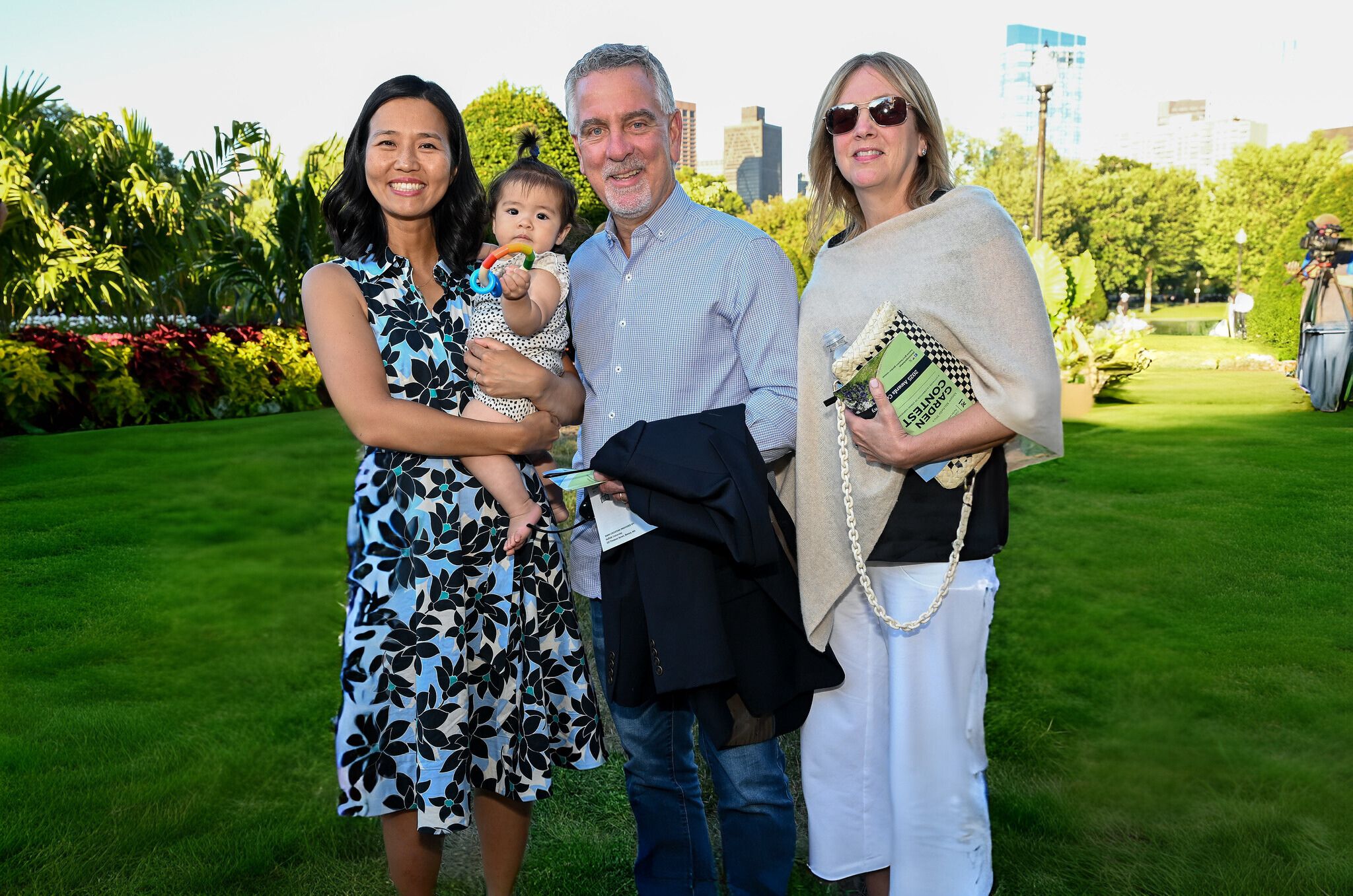Mahoney's Garden Center Co-owner Tom Mahoney with wife Cindy and Boston Mayor Michelle Wu and her baby daughter Mira.